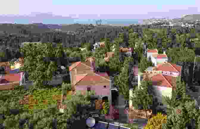 A Panoramic View Of A Picturesque Apokoronas Village With Its Whitewashed Houses, Red Tiled Roofs, And Lush Surroundings. Images Of Crete The Apokoronas Area