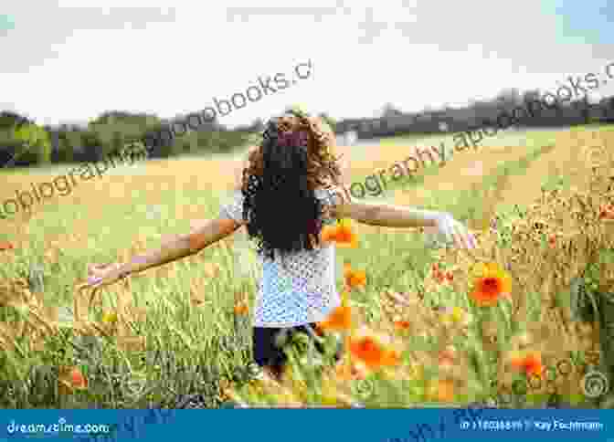 A Young Woman Standing In A Field Of Wildflowers, Arms Outstretched, Embracing The Beauty Of Nature Picture Of Grace Josh Armstrong