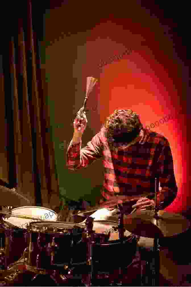 Drummer Passionately Performing On A Drum Set, Capturing The Essence Of Rhythmic Mastery Discover Drumset Rhythms: Vital Beats Every Drummer Must Know: Guide To Play Popular Drumset Rhythms