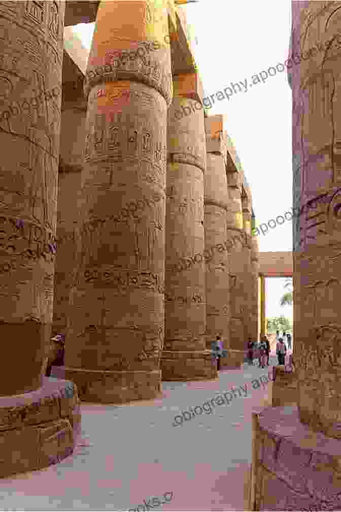 Grand Columns And Hieroglyphs Adorn The Temple Of Karnak, A Sacred Site And Architectural Marvel Out Of The Black Land