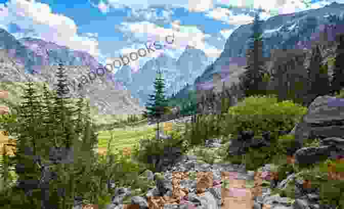 Hikers Traversing A Scenic Trail Amidst The Towering Peaks Of The Grand Teton Mountains Explorer S Guide Wyoming (Explorer S Complete)