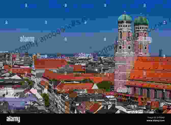 Panoramic View Of Munich's Skyline With The Iconic Frauenkirche In The Foreground. Mobile Munich Aimee Seu